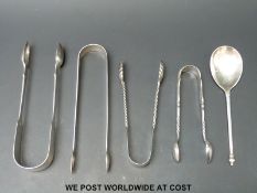 Four sets of Georgian and later hallmarked silver sets of sugar tongs together with a hallmarked