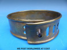 A Georgian/Victorian heavy brass dog collar with four slot and loop adjustment,