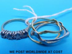 A 18ct gold bi-coloured Russian style ring and a 9ct gold ring set with topaz and clear stones