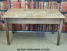 A pine kitchen table.