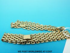 A yellow metal bracelet marked 18ct gold and a similar matching bracelet (30.