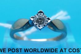 A 9ct gold ring set with a diamond in a square setting (size N)