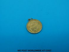 A 1902 gold half sovereign in clip mount (4.