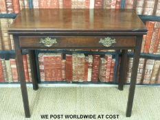 A Georgian mahogany fold-over card table with single drawer,