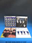 Four Beatles LPs,
