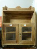 A pine hanging cupboard and shelf unit (W61 x D18 x H96)