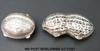 Two novelty white metal boxes formed as nuts,
