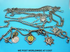 A large quantity silver/ white metal Alberts/ watch chains and fobs