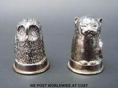 A pair of hallmarked silver novelty salt/pepper formed as the owl and the pussycat, height 3cm,