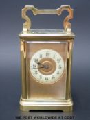 A brass cased carriage clock,
