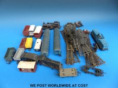 Four Hornby 00 gauge locomotives together with a collection of rolling stock etc.