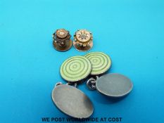 A pair of silver and enamel cufflinks and two diamond and gold studs.