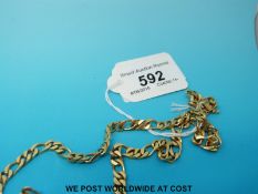 A 9ct gold curb link necklace (34.