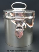 A George V hallmarked silver biscuit barrel,