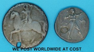 A Greek silver coin together with a possibly Roman example