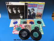 A collection of approximately 20x records which includes: “With The Beatles” (LP);