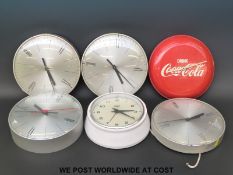 Four 'slave' dial clocks,