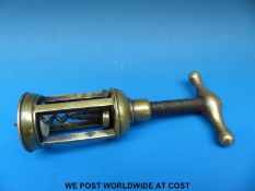 A brass four pillar corkscrew
