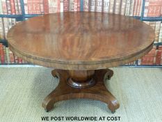 A 19thC circular mahogany breakfast table with crossbanded rosewood surround,