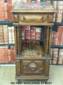A late 19thC carved mahogany marble topped pot cupboard with single drawer above cubby hole with