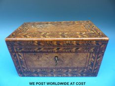 A walnut parquetry inlaid tea caddy, (21cm x 12cm x11cm).