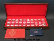 A cased set of 51 hallmarked silver ingots 