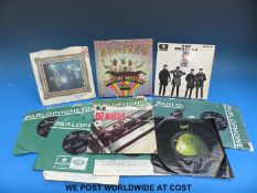 The Beatles: an excellent collection of first pressing 16x singles and 4x EPs,