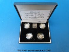The 1994 - 1997 UK silver proof piedfort £1 coin collection with certificates