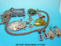 An unusual white metal necklace, a silver brooch set with malachite, a silver brooch marked GOOR,
