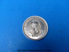 A cased silver 1940 'not so easily shall the Lights of freedom die' Winston Churchill obverse