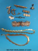 Two white metal brooches in the form of Chinese characters marked 85, a sterling silver brooch,