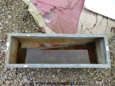 A galvanised trough/feeder (length 92cm)