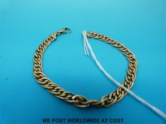 A yellow metal multi-link bracelet marked 375 (7.