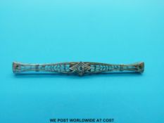 A white metal brooch set with a diamond in an Art Deco design (3g all in)