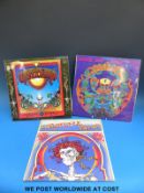 Three LPs by The Grateful Dead: “Anthem Of The Sun” (Flip-back sleeve,
