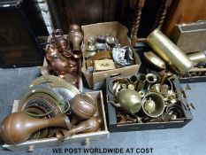 A large collection of copper and brass ware to include plated ware and clocks, horse brasses, etc.