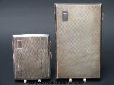 Two hallmarked silver engine turned cigarette cases (324g)
