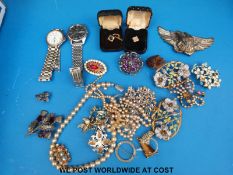 Costume jewellery to include eagle buckle, watches, brooches, etc.
