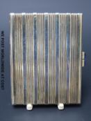 A Cartier hallmarked silver gilt pocket double photograph case with lapis lazuli thumb pieces,