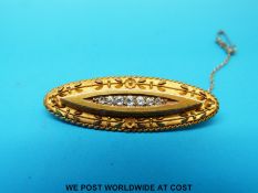A 15ct gold brooch set with diamonds