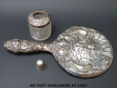 A hallmarked silver embossed dressing table mirror,