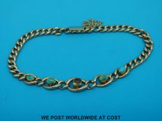 A 9ct gold curb bracelet set with turquoise (12.