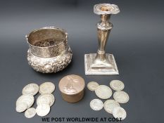 A hallmarked silver screw top pill box, hallmarked silver candlestick,