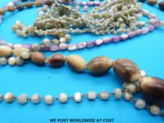 A necklace made up of graduated oval beads,