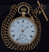 A gold plated Waltham pocket watch with yellow metal fob chain
