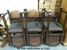 Six leather upholstered oak chairs