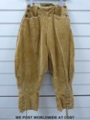 A pair of corduroy Women's Land Army breeches with Ministry mark,
