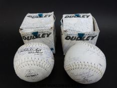 Two Dudley 'White Thunder' softballs with various signatures and messages, both in original boxes.
