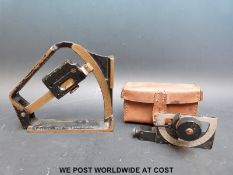 A British military Mark VI field clinometer dated 1941 and a cased Mk 5 clinometer