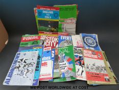 A collection of various football programmes circa 1960s and 1970s, including Manchester United,